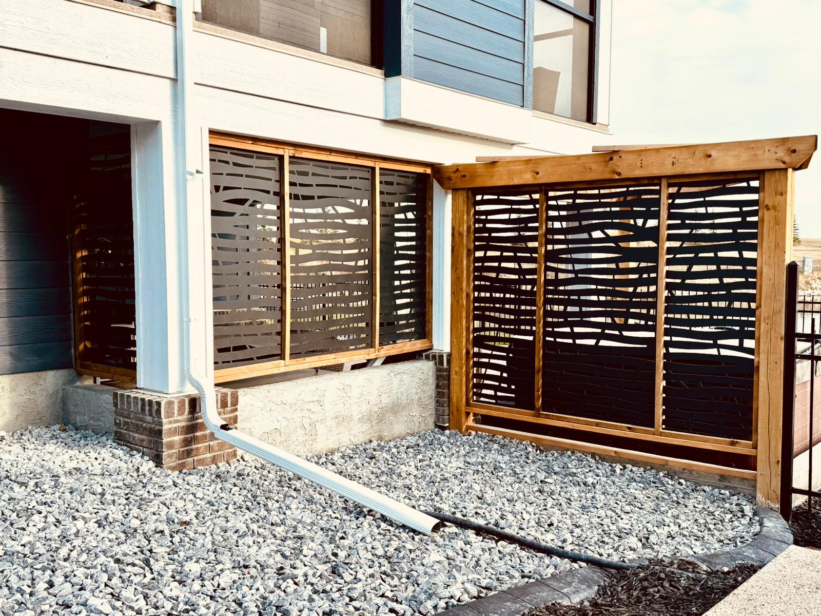 Modern home exterior with wooden privacy screens