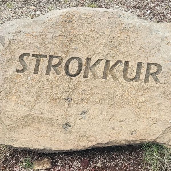 Rock engraved with the word STROKKUR
